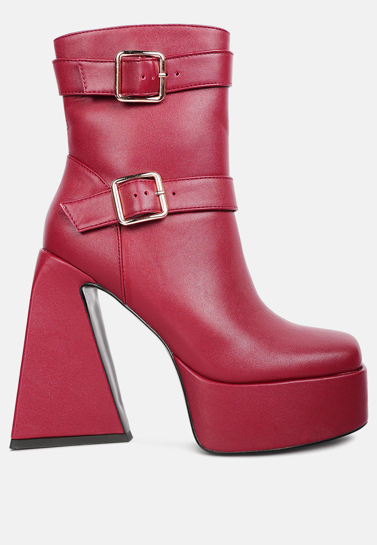 Hot Cocoa High Platform Ankle Boots with twin buckle straps and block heels, showcasing a stylish patent PU finish.