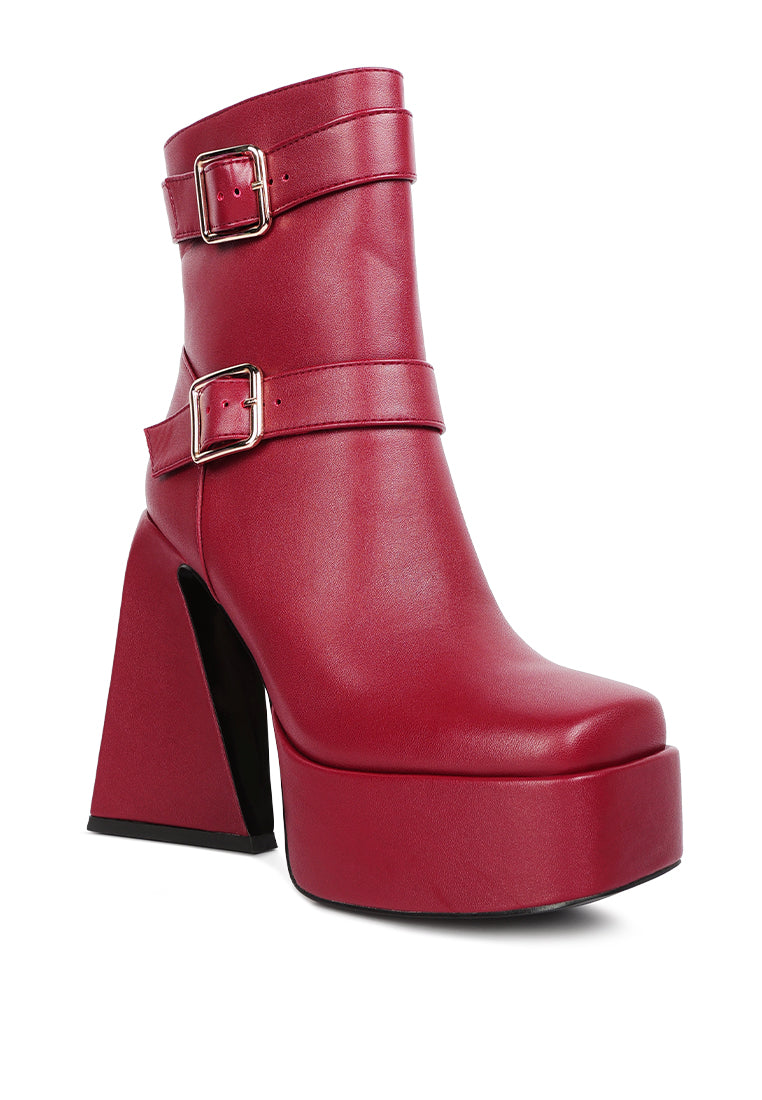 Hot Cocoa High Platform Ankle Boots with twin buckle straps and block heels, showcasing a stylish patent PU finish.