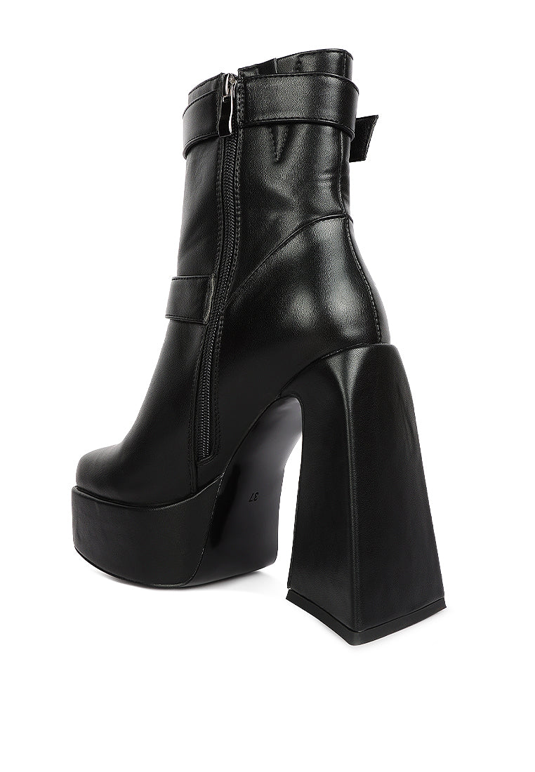 Hot Cocoa High Platform Ankle Boots with twin buckle straps and block heels, showcasing a stylish patent PU finish.