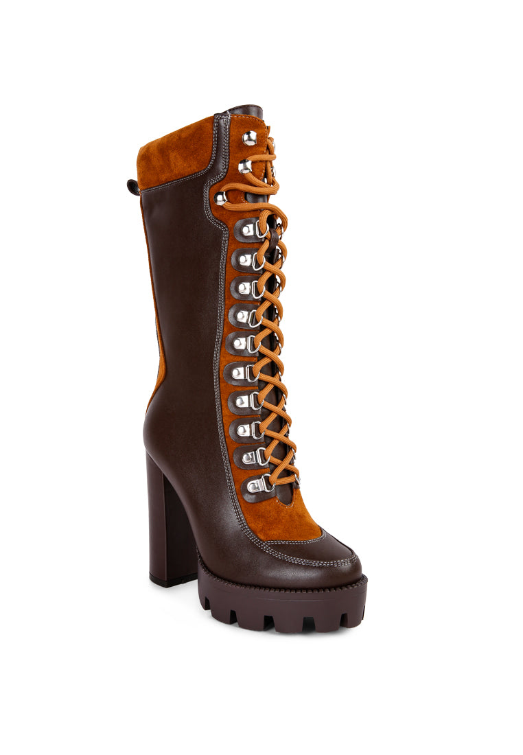 Igloo Over The Ankle Cushion Collared Boots featuring a stylish design with a chunky lug sole, lace-up detail, and side zipper for easy wear.