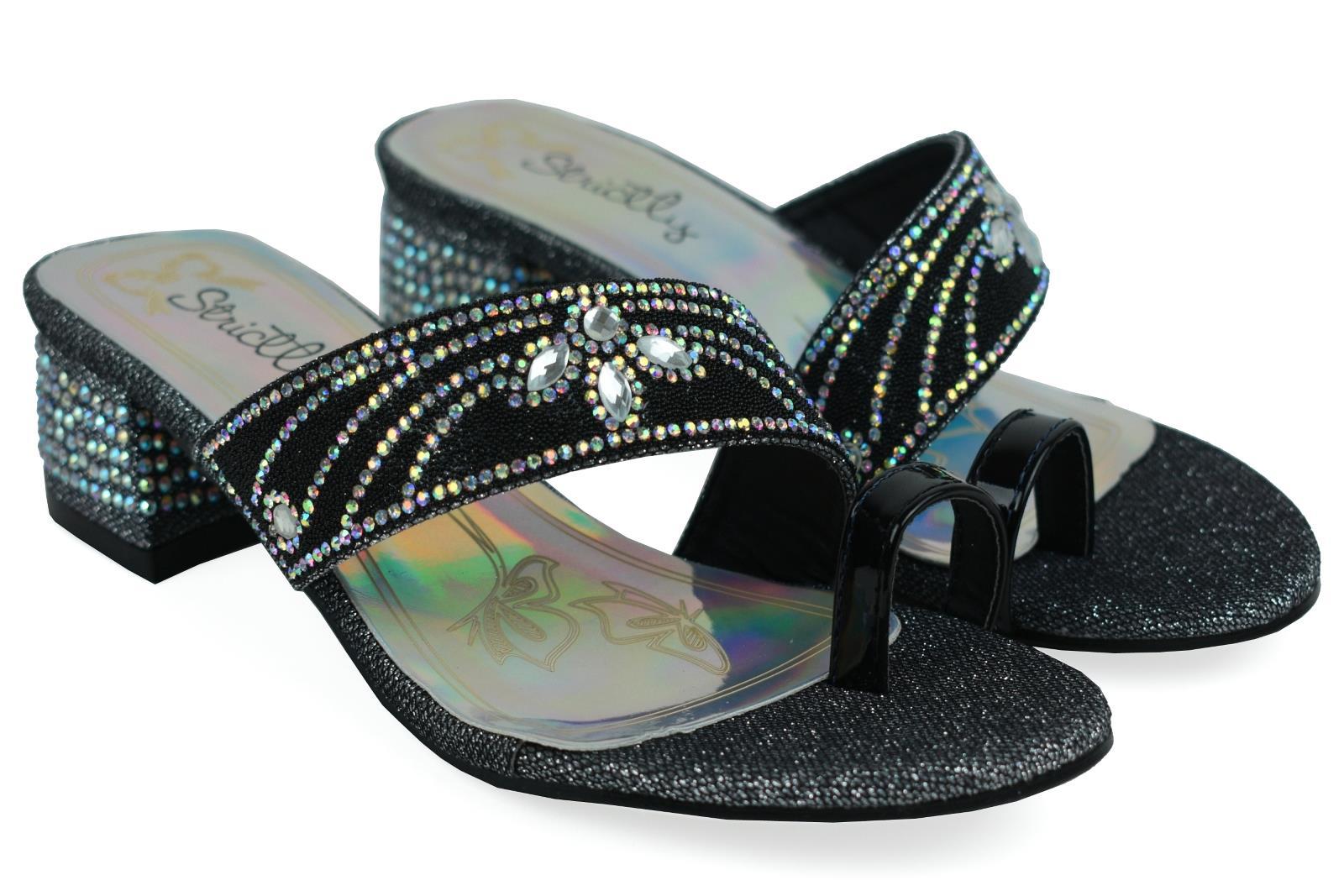 A pair of stylish Indian Style Toe Post Black sandals featuring a sleek design and comfortable toe post.