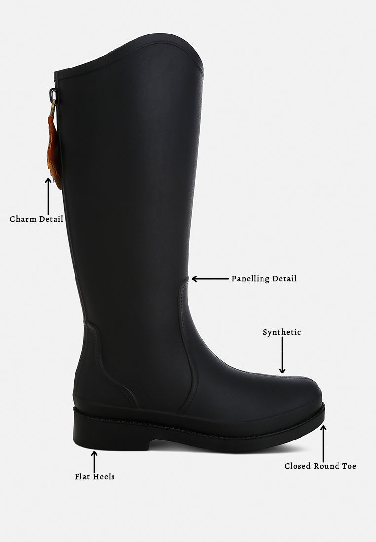 Indiana Charm Detail Calf Boots featuring a unique charm design, zipper closure, and a stylish synthetic upper material.