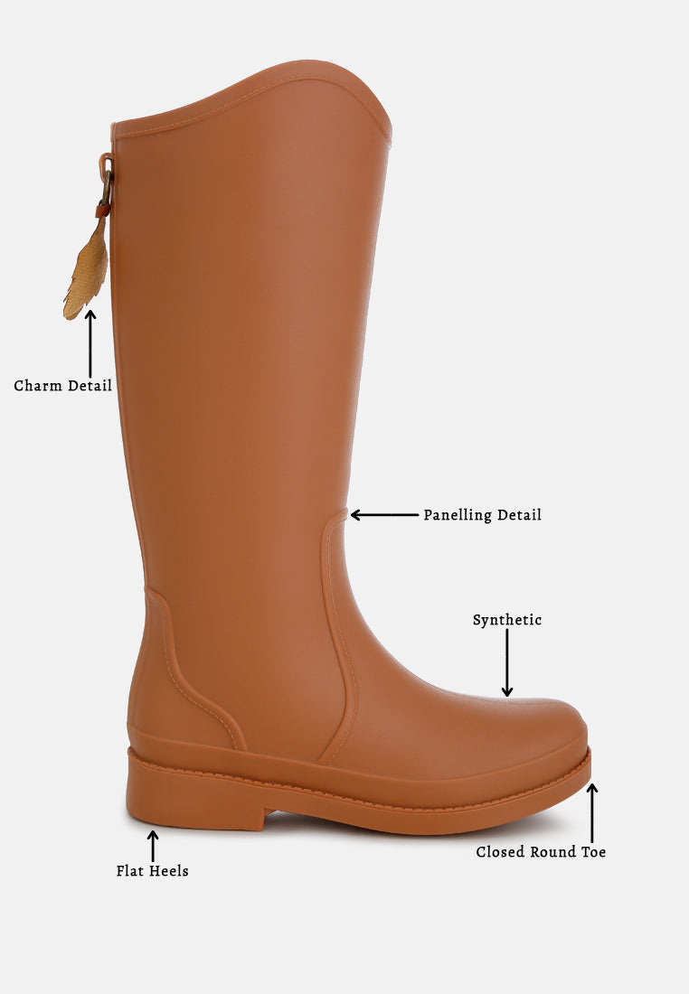 Indiana Charm Detail Calf Boots featuring a unique charm design, zipper closure, and a stylish synthetic upper material.