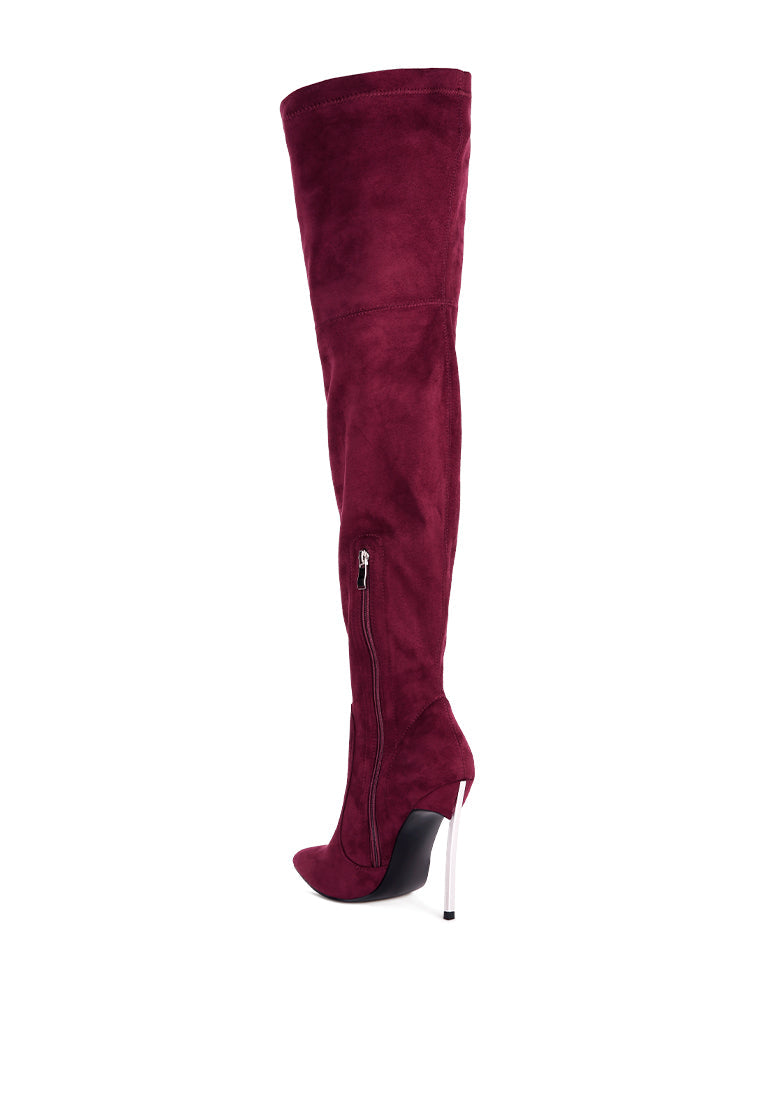 Jaynetts Stretch Suede Micro High Knee Boots featuring a sleek design, metallic pointed heels, and a side zipper for easy wear.