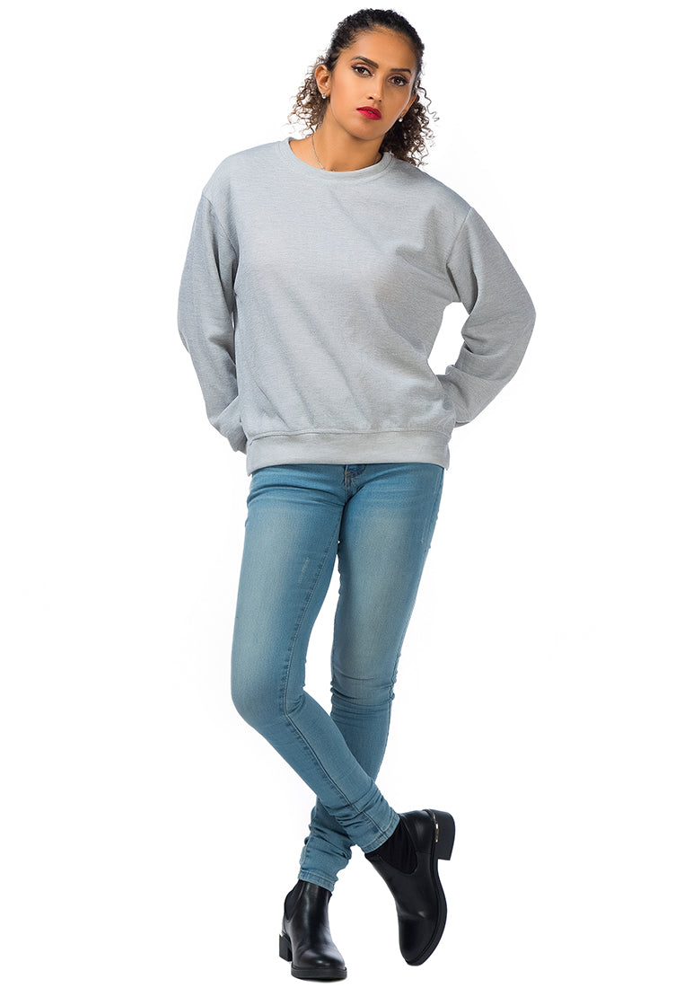 A cozy knitted long sleeve pullover sweatshirt with a crew neckline, ribbed hem, and side slits, made from soft cotton fabric.