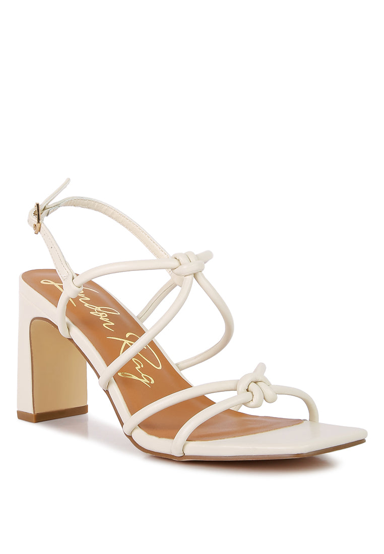 Kralor Knotted Strap Italian Block Heel Sandals featuring bright knot detail and mid-heel design, perfect for summer casual wear.