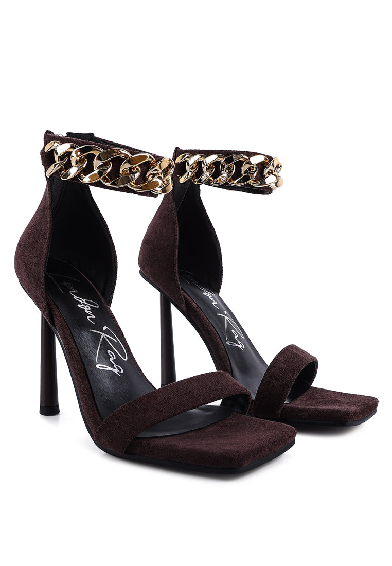 Last Sip Micro Suede High Heel Sandals featuring a thin cylindrical heel, metallic chain detail, and square toe design.