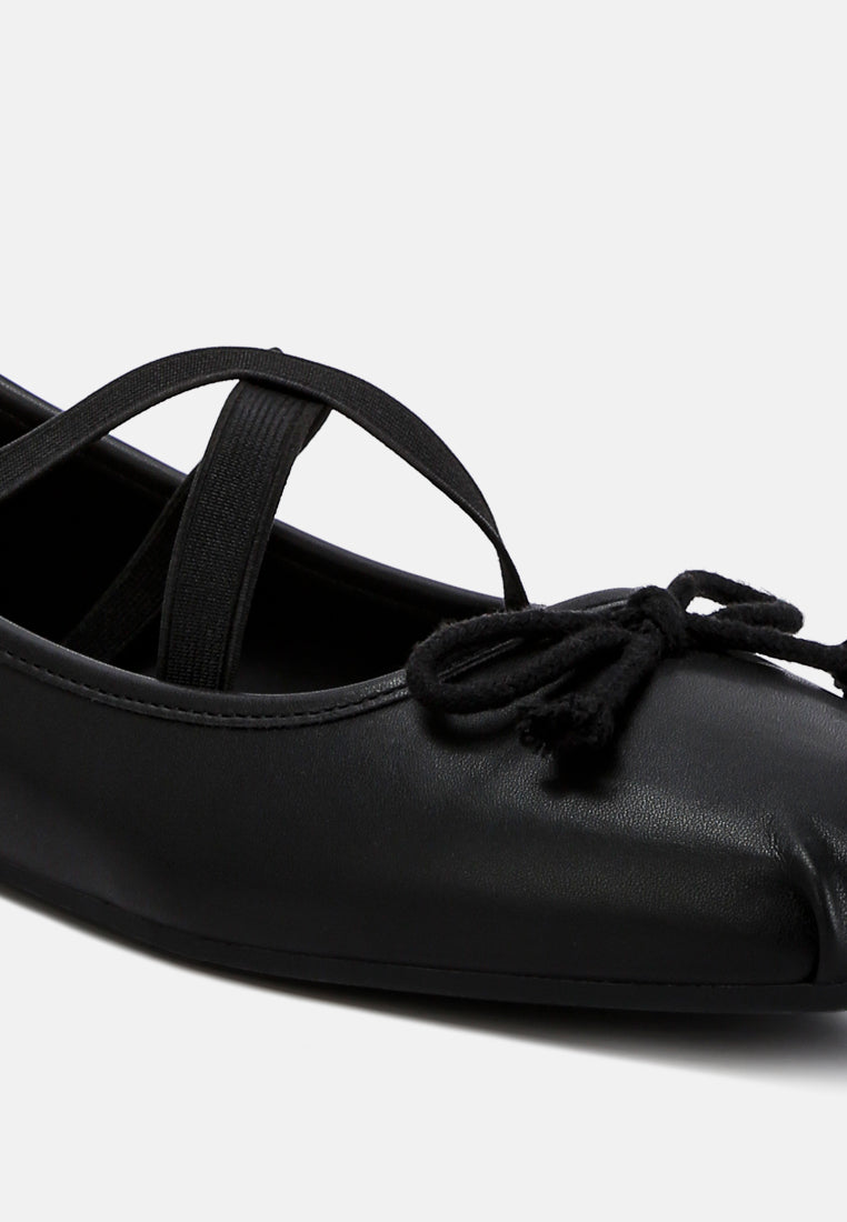 Leina Recycled Faux Leather Ballet Flats featuring criss-cross straps and bow embellishment, perfect for stylish comfort.