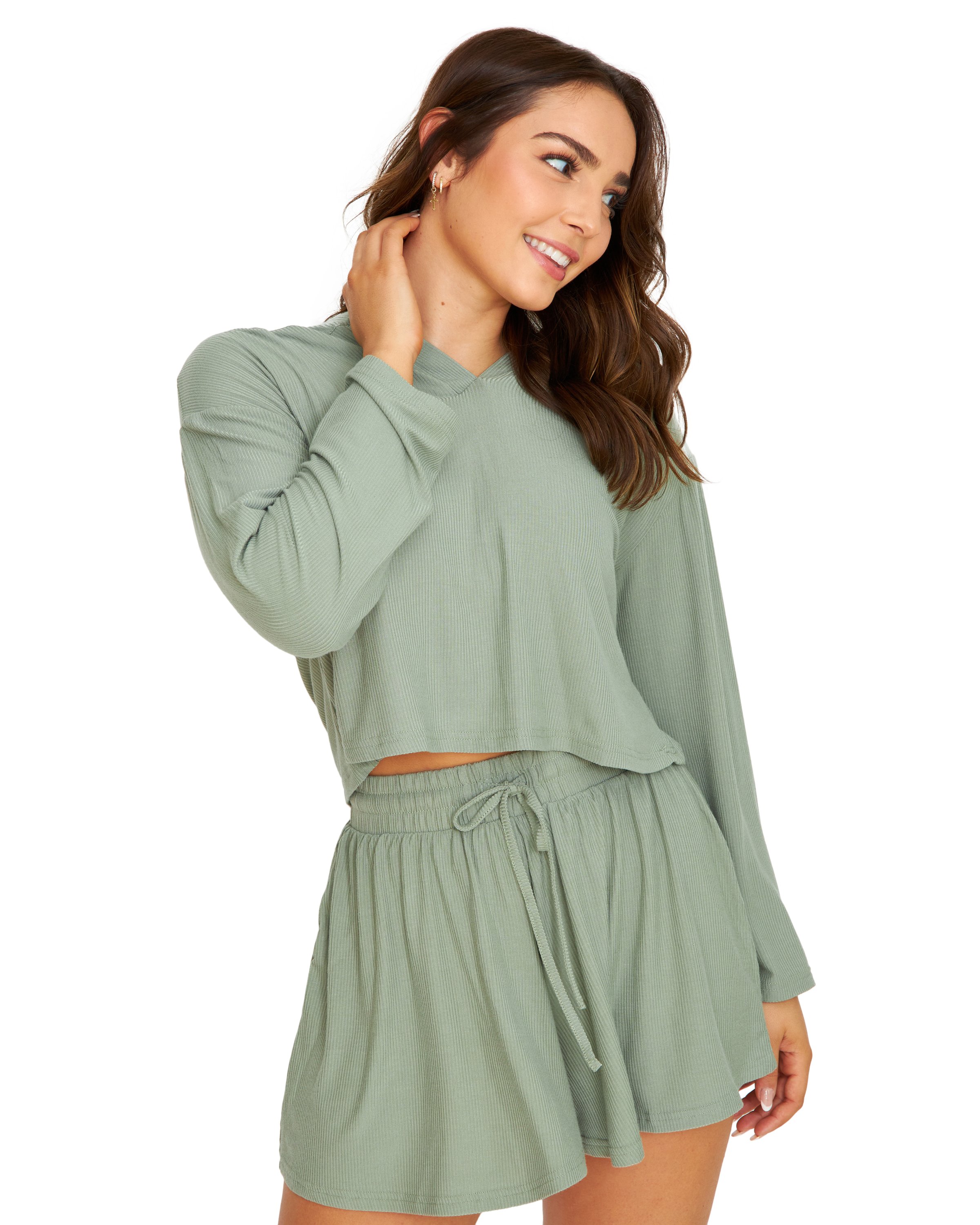 A stylish olive pullover with a v-neckline and hoodie, perfect for lounging and self-care days.