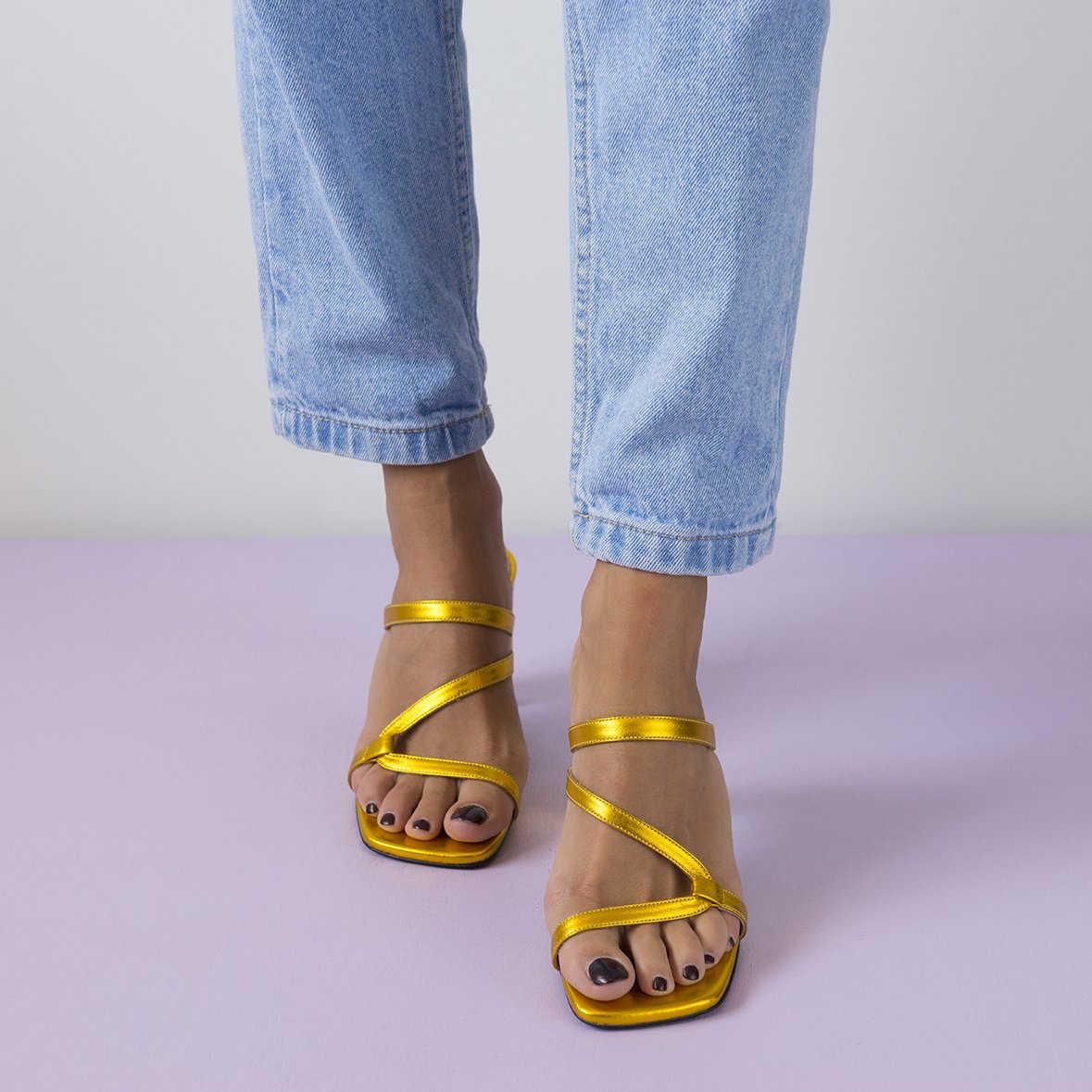 LILY Gold shoes featuring metallic leather upper, thin straps, and square cut toes, handcrafted in Portugal.