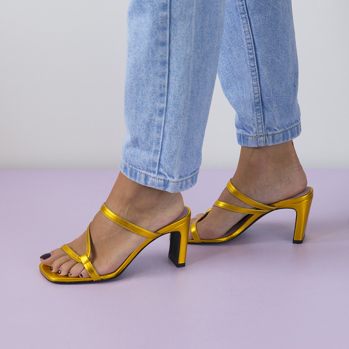 LILY Gold shoes featuring metallic leather upper, thin straps, and square cut toes, handcrafted in Portugal.