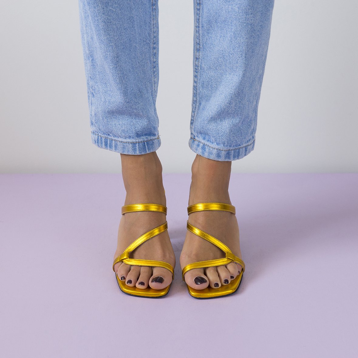 LILY Gold shoes featuring metallic leather upper, thin straps, and square cut toes, handcrafted in Portugal.