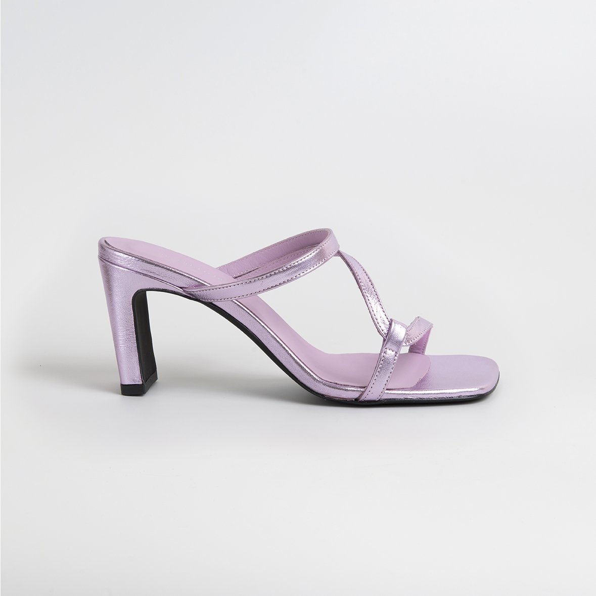 LILY Lilac shoes featuring a metallic leather upper with thin straps and square cut toes, handcrafted in Portugal.