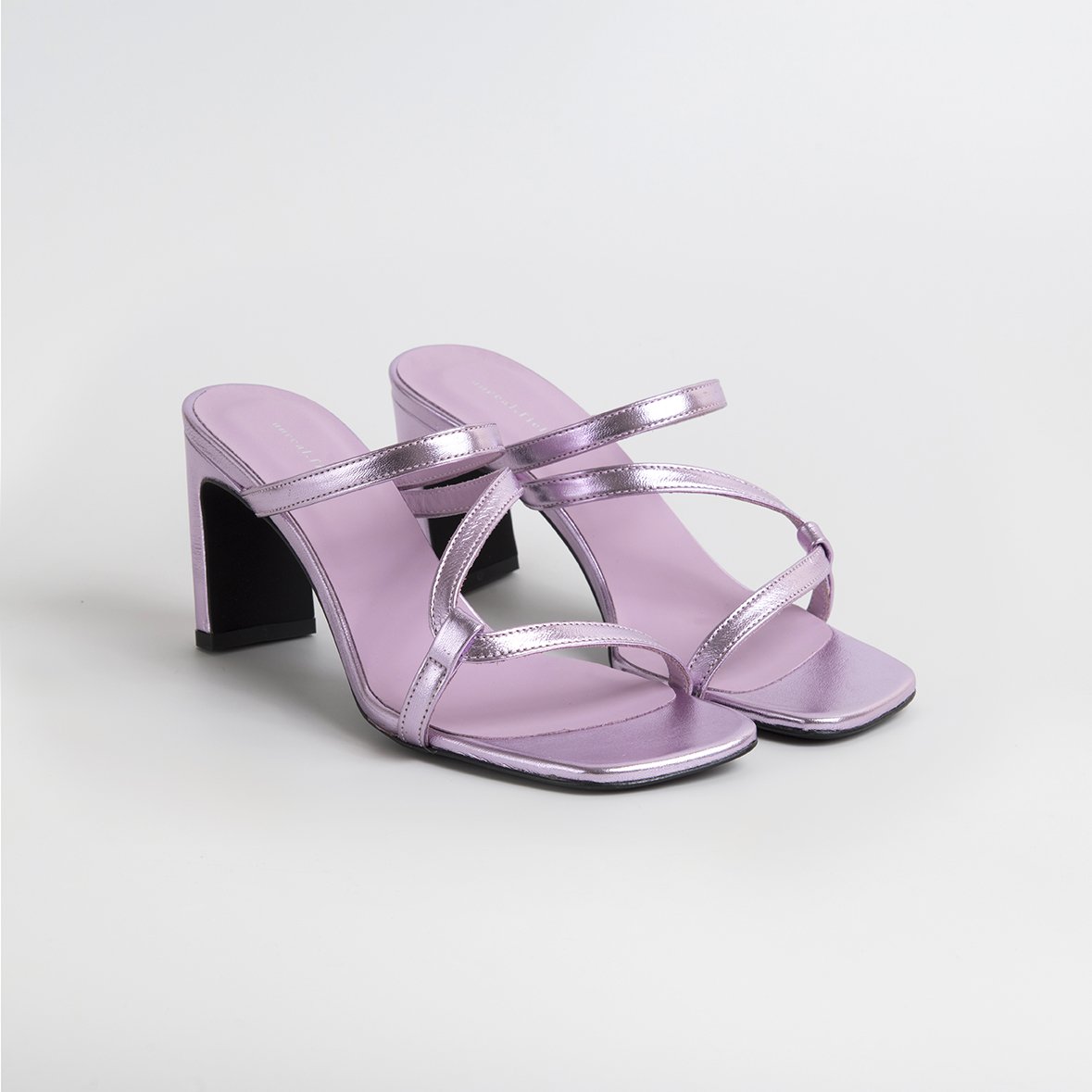 LILY Lilac shoes featuring a metallic leather upper with thin straps and square cut toes, handcrafted in Portugal.