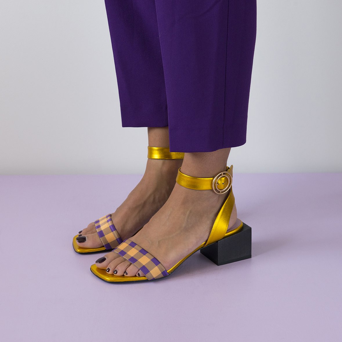 Handcrafted LOLITA Gold/Purple sandals featuring metallic leather, plaid satin, square toe, and wood heel with a gold buckle fastening.