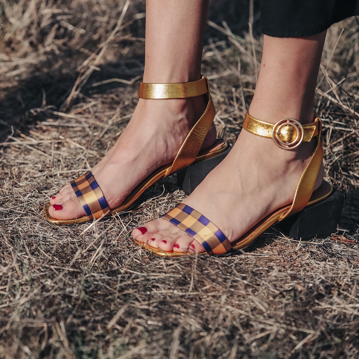 Handcrafted LOLITA Gold/Purple sandals featuring metallic leather, plaid satin, square toe, and wood heel with a gold buckle fastening.