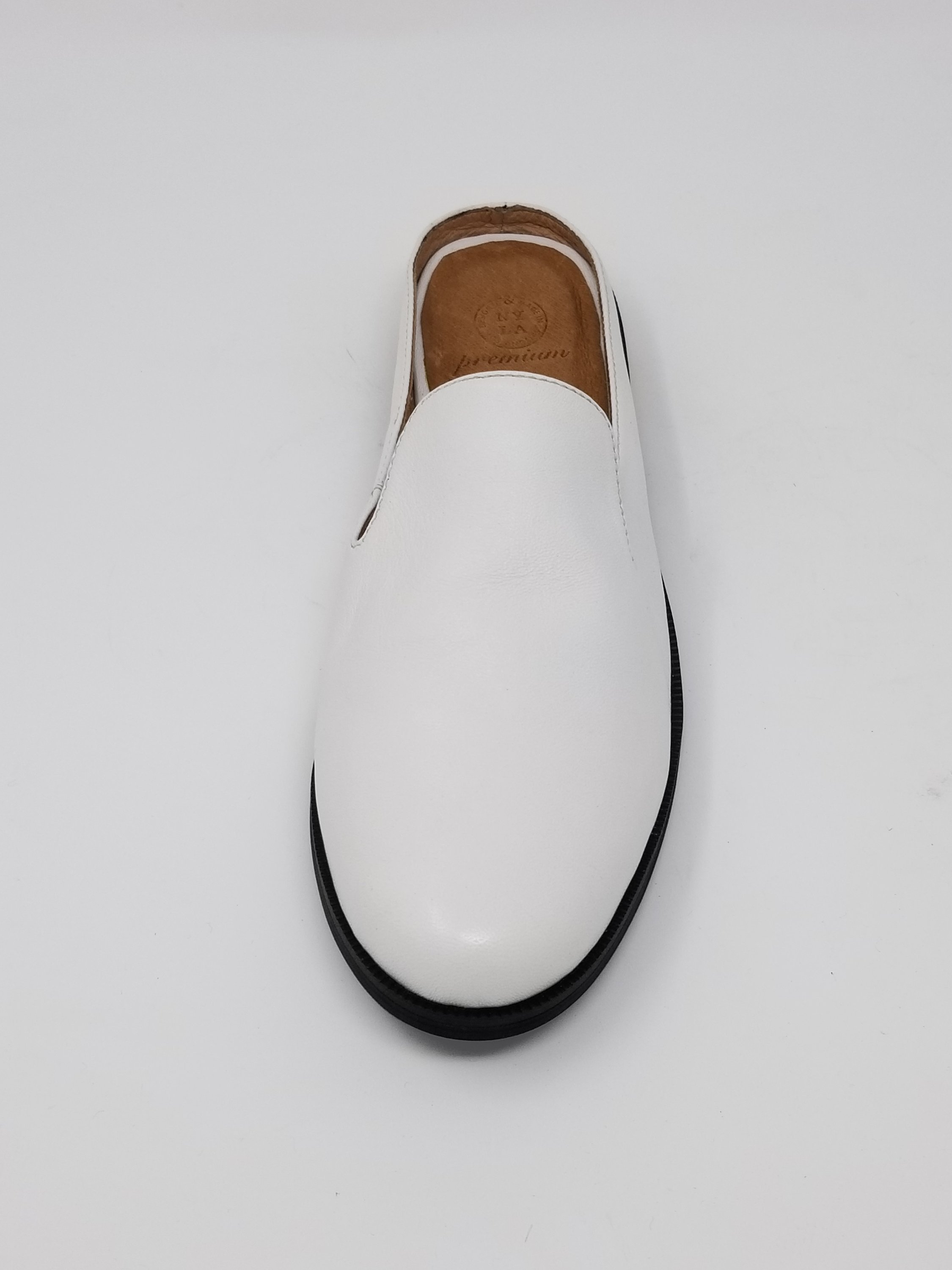 A pair of Long Beach shoes made from premium leather, featuring a sleek design with a full foam insole and slip-resistant outsole, perfect for comfort and style.