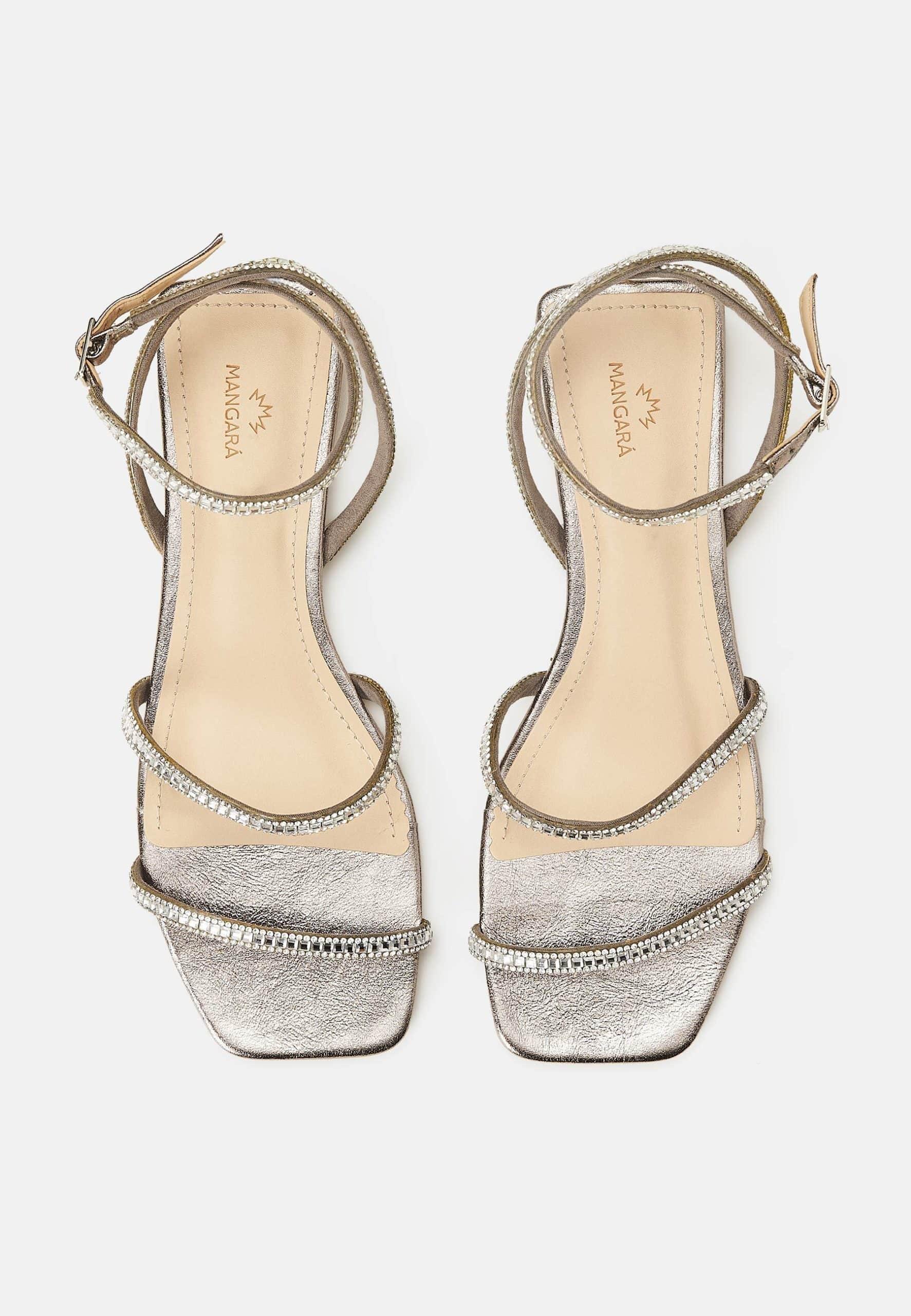 A pair of Mangará Aroeira Summer Sandals featuring stylish straps and sparkling crystal embellishments, perfect for summer outings.