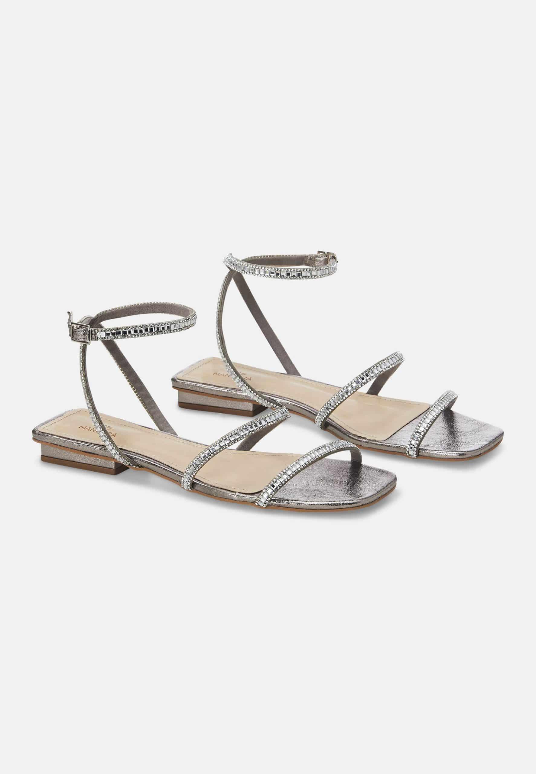 A pair of Mangará Aroeira Summer Sandals featuring stylish straps and sparkling crystal embellishments, perfect for summer outings.