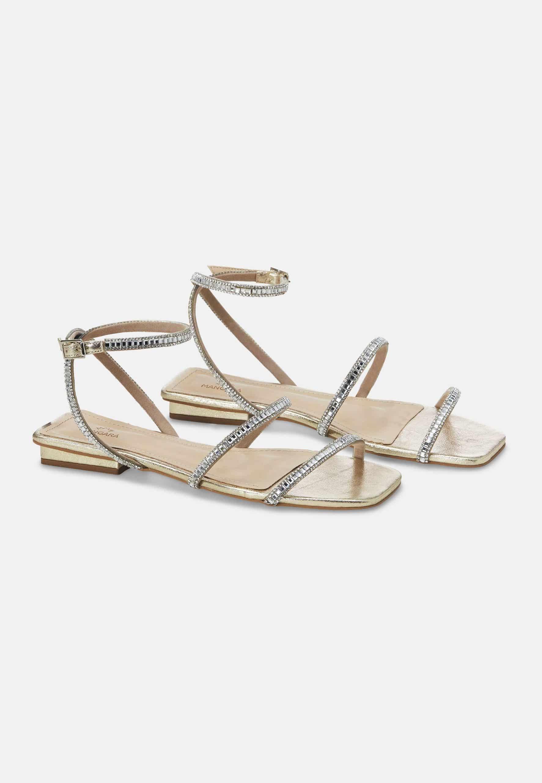 A pair of Mangará Aroeira Summer Sandals featuring stylish straps and sparkling crystal embellishments, perfect for summer outings.