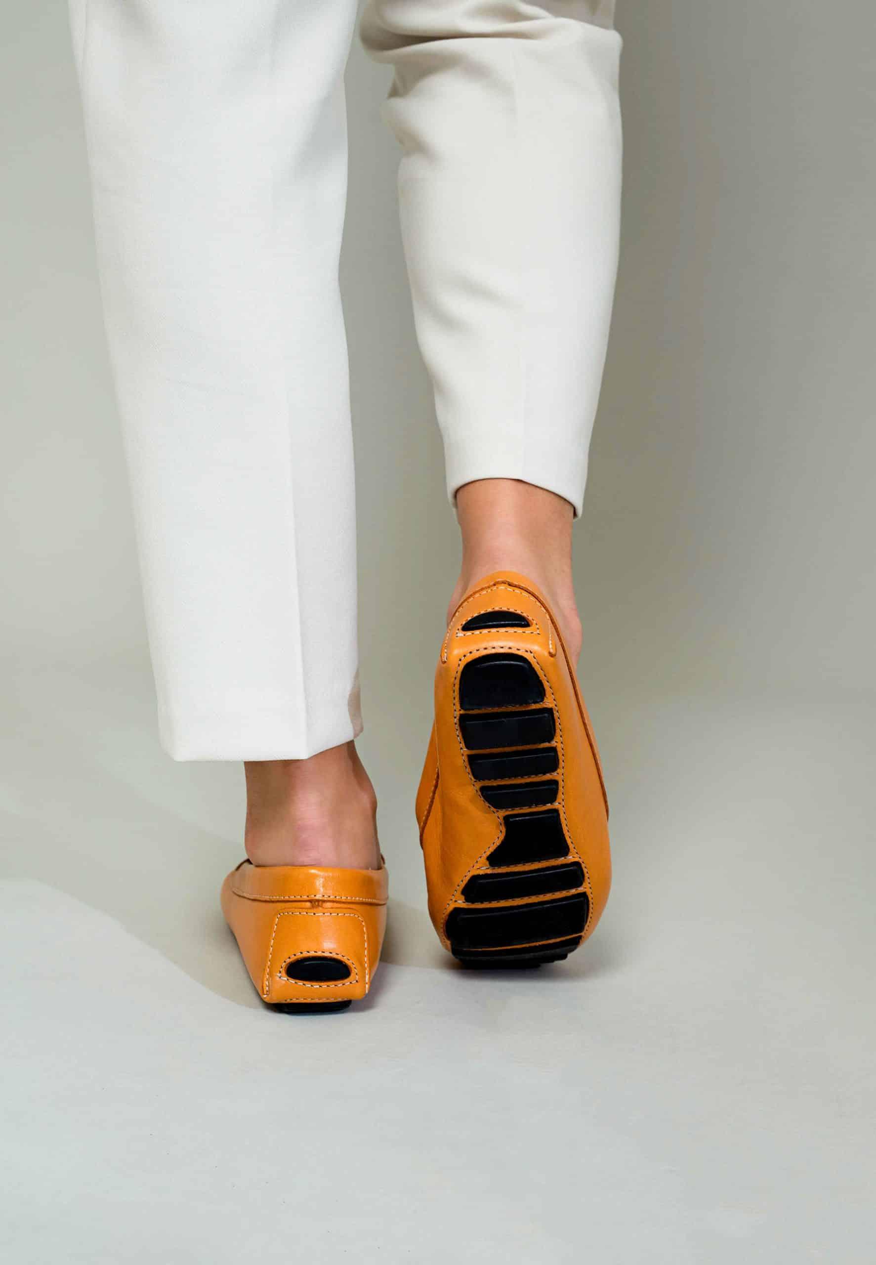 A pair of stylish Mangará Caviúna Women's Loafers featuring a sleek silhouette in a versatile color, perfect for any occasion.