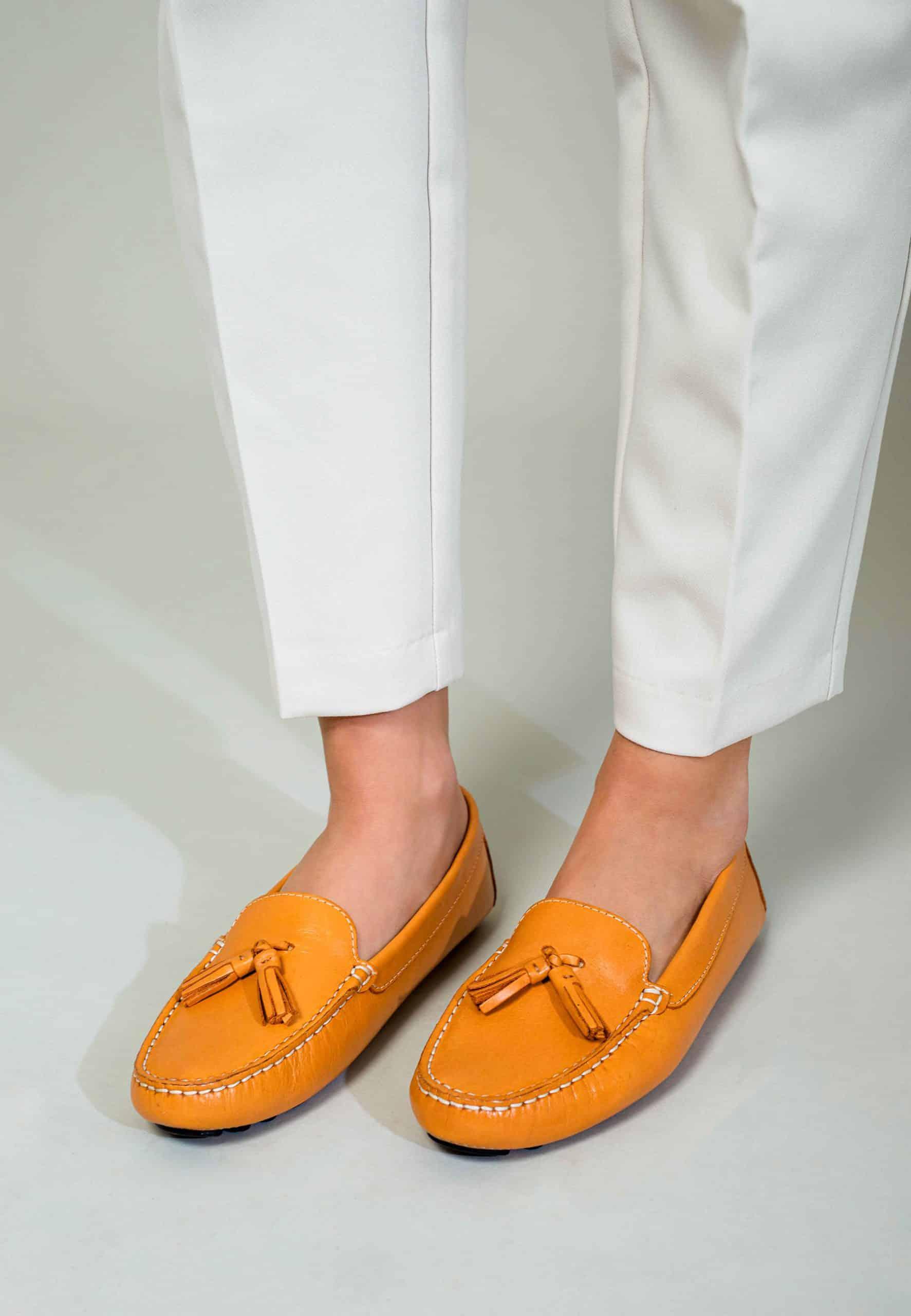 A pair of stylish Mangará Caviúna Women's Loafers featuring a sleek silhouette in a versatile color, perfect for any occasion.