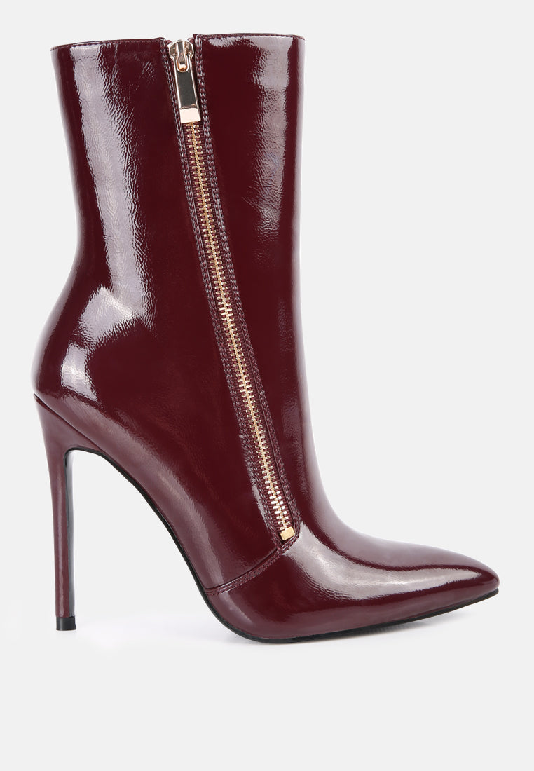 Mania High Heeled Ankle Boots featuring a closed pointed toe and stylish design, available in various colors.