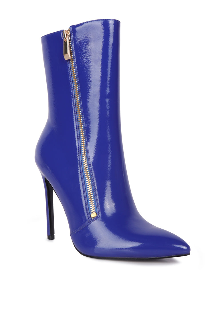 Mania High Heeled Ankle Boots featuring a closed pointed toe and stylish design, available in various colors.