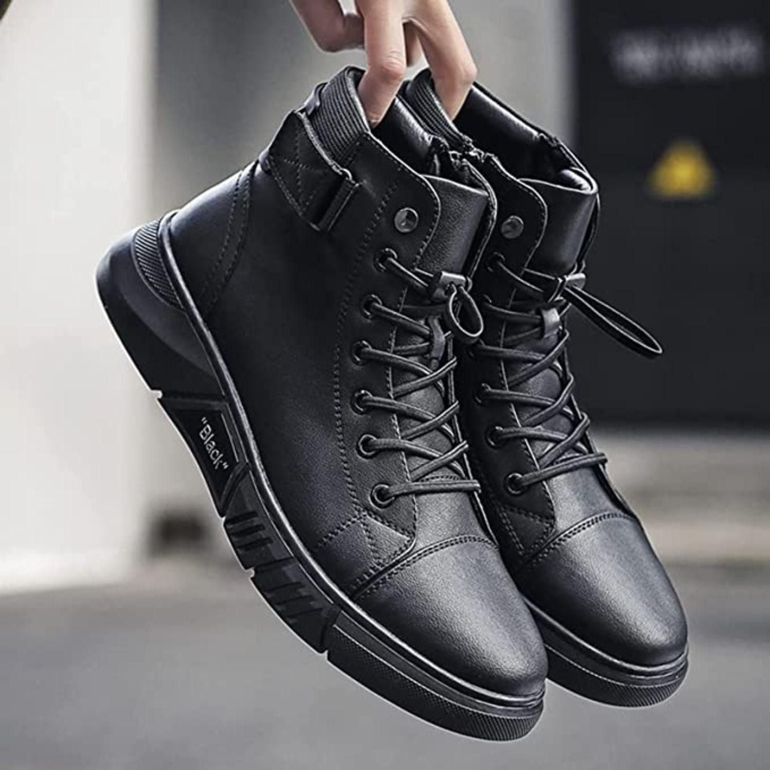 A pair of stylish black synthetic boots for men with lace-up closure, designed for casual occasions.