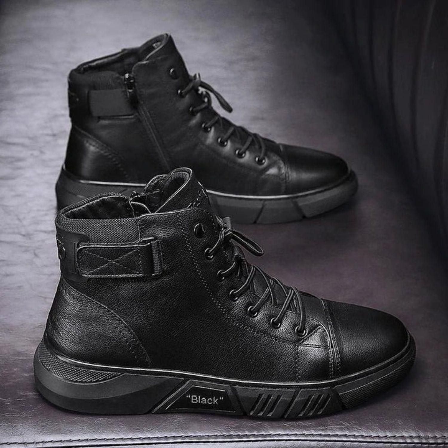 A pair of stylish black synthetic boots for men with lace-up closure, designed for casual occasions.