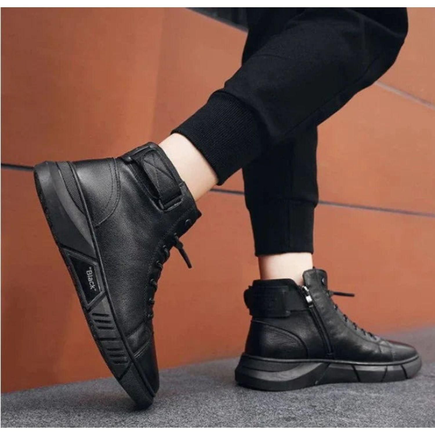 A pair of stylish black synthetic boots for men with lace-up closure, designed for casual occasions.