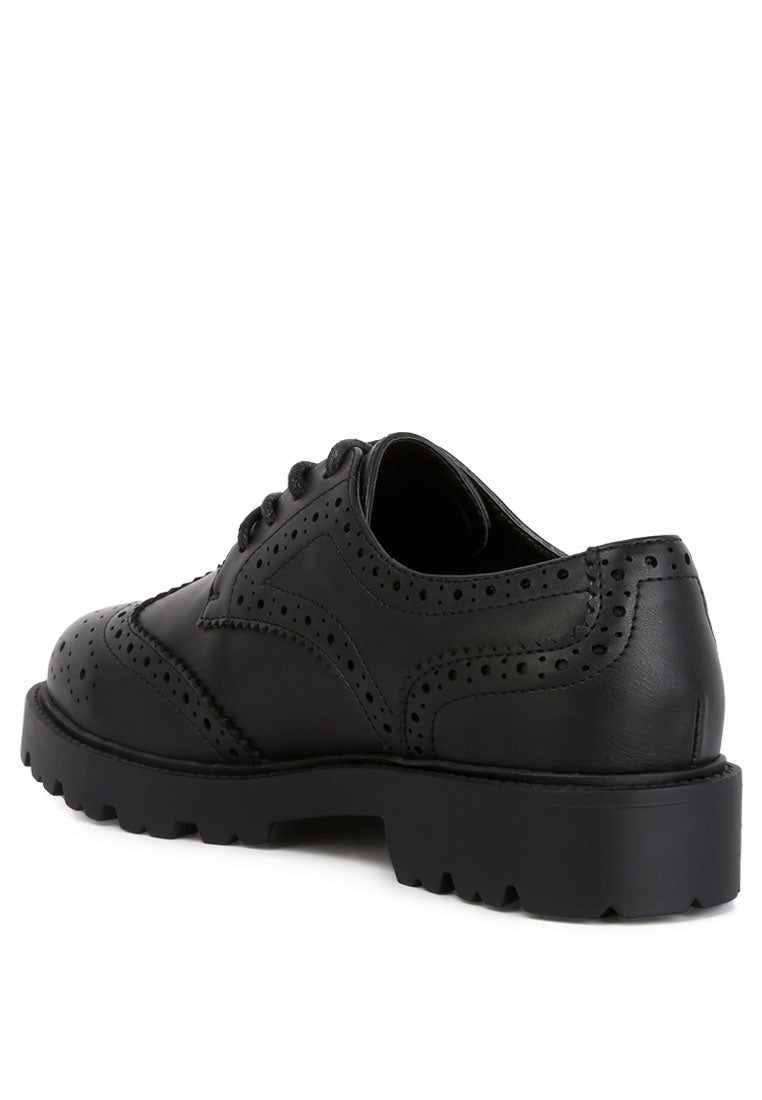 Milou Lug Sole Derby Shoes featuring faux leather upper, lace-up design, and unique perforated detailing.