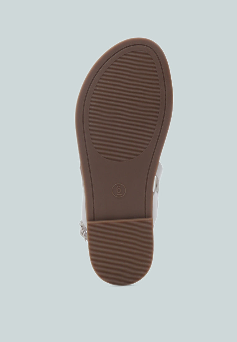 Miya Slingback Flat Sandals in stylish faux leather, perfect for casual outings and beach days.