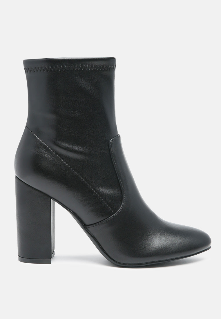 Moonstone Block Heeled Boots in black with pointed toe and side zipper, showcasing a stylish and durable design.