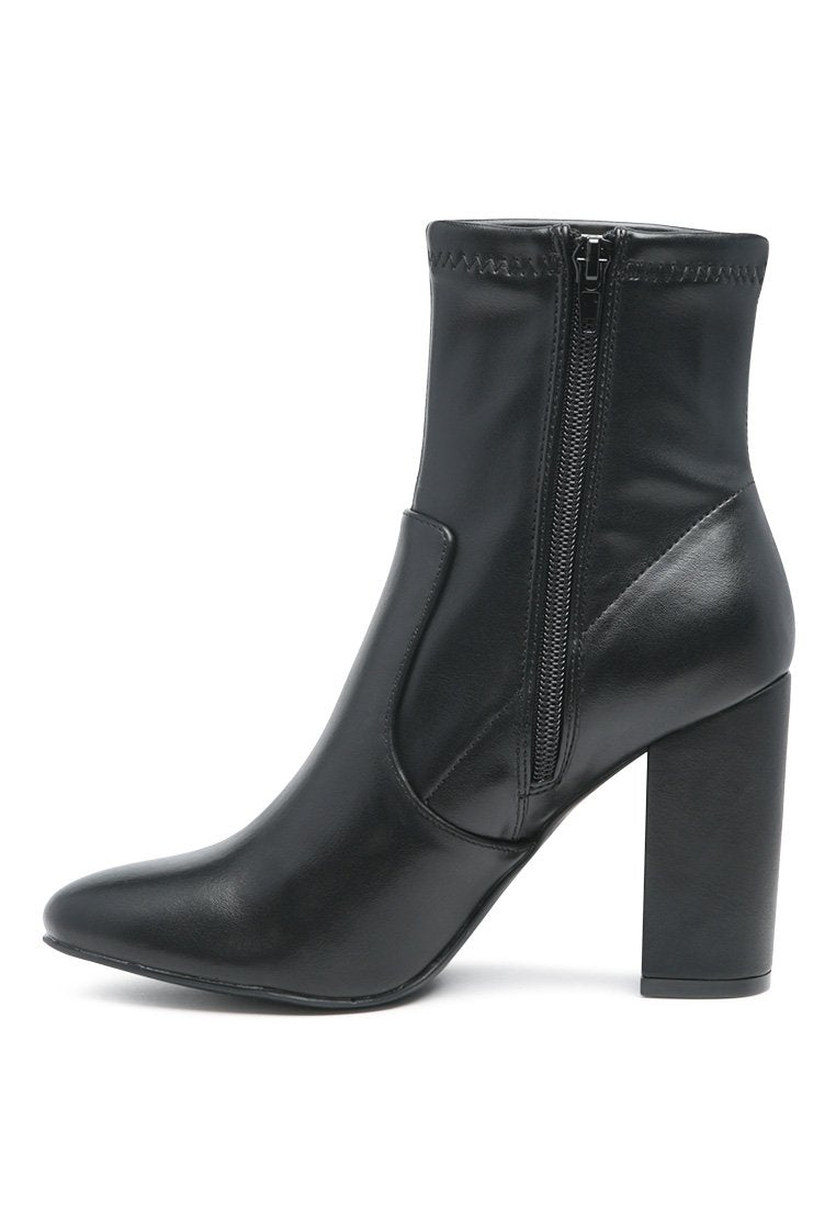 Moonstone Block Heeled Boots in black with pointed toe and side zipper, showcasing a stylish and durable design.