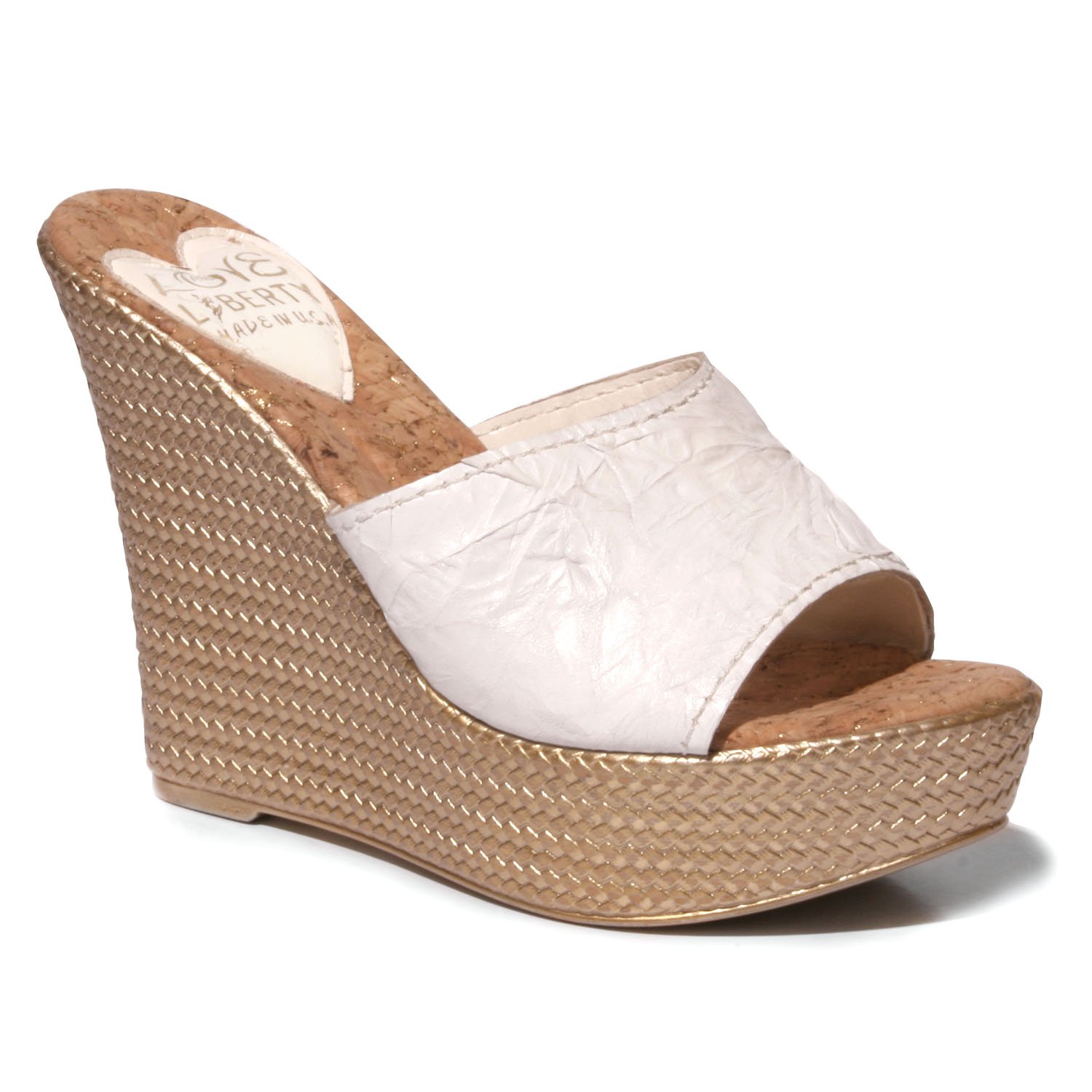 Stylish Ms. Independent hip wedge sandals with crinkle leather upper and snake print sock.