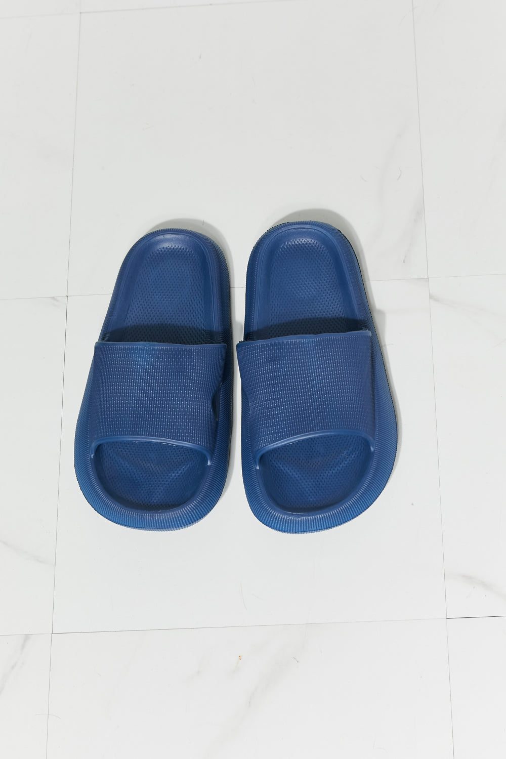 MMShoes Arms Around Me Open Toe Slide in Navy, showcasing a stylish rubber design perfect for casual outings.