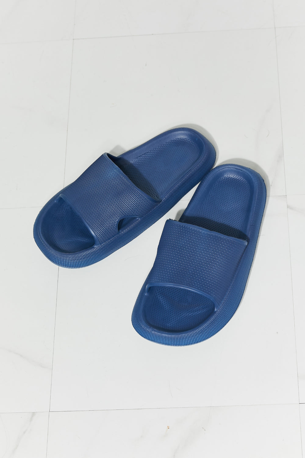 MMShoes Arms Around Me Open Toe Slide in Navy, showcasing a stylish rubber design perfect for casual outings.