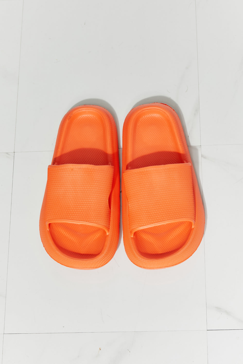 MMShoes Arms Around Me Open Toe Slide in vibrant orange, showcasing a comfortable rubber design perfect for casual wear.