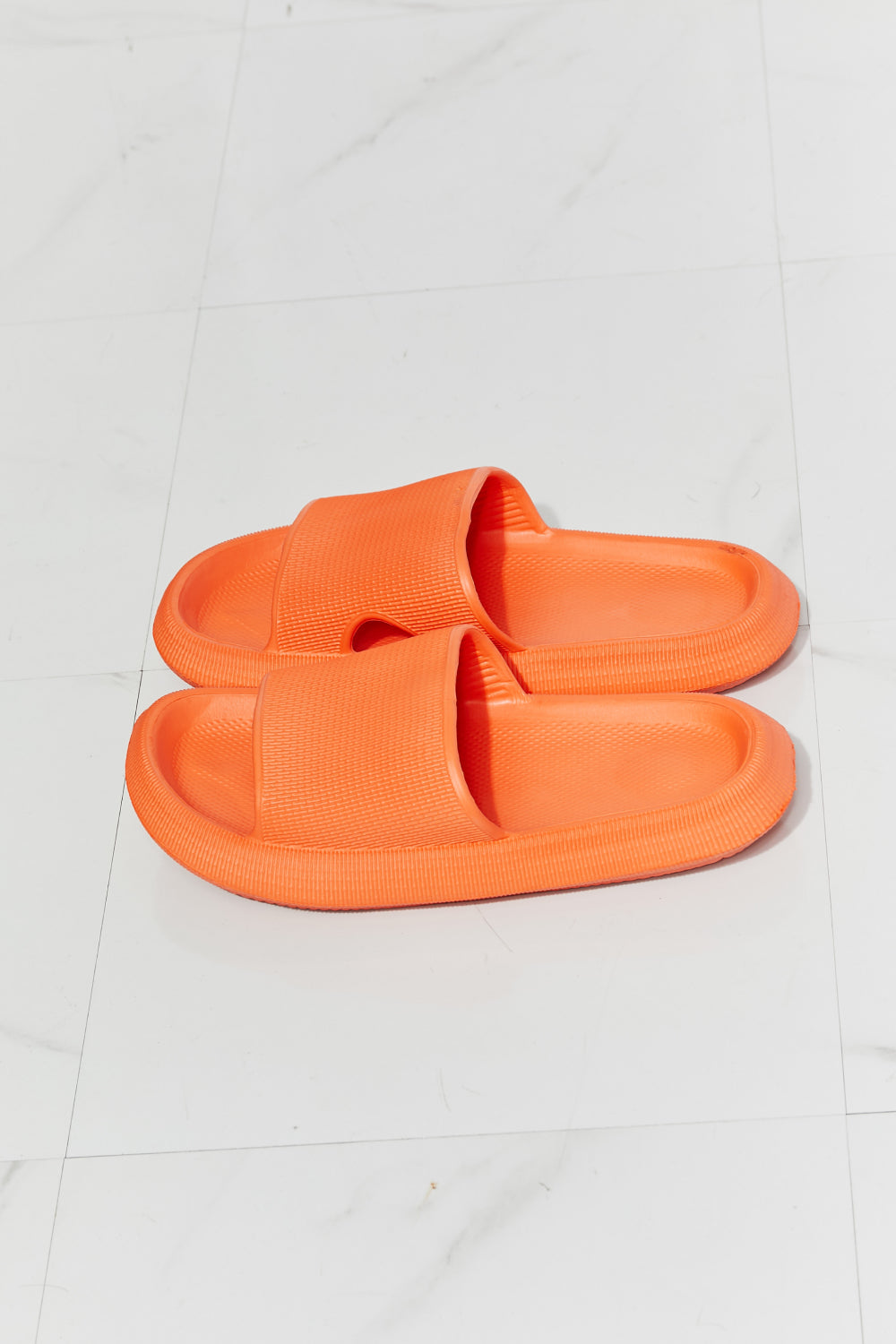 MMShoes Arms Around Me Open Toe Slide in vibrant orange, showcasing a comfortable rubber design perfect for casual wear.