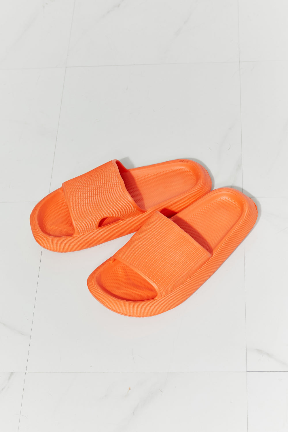 MMShoes Arms Around Me Open Toe Slide in vibrant orange, showcasing a comfortable rubber design perfect for casual wear.