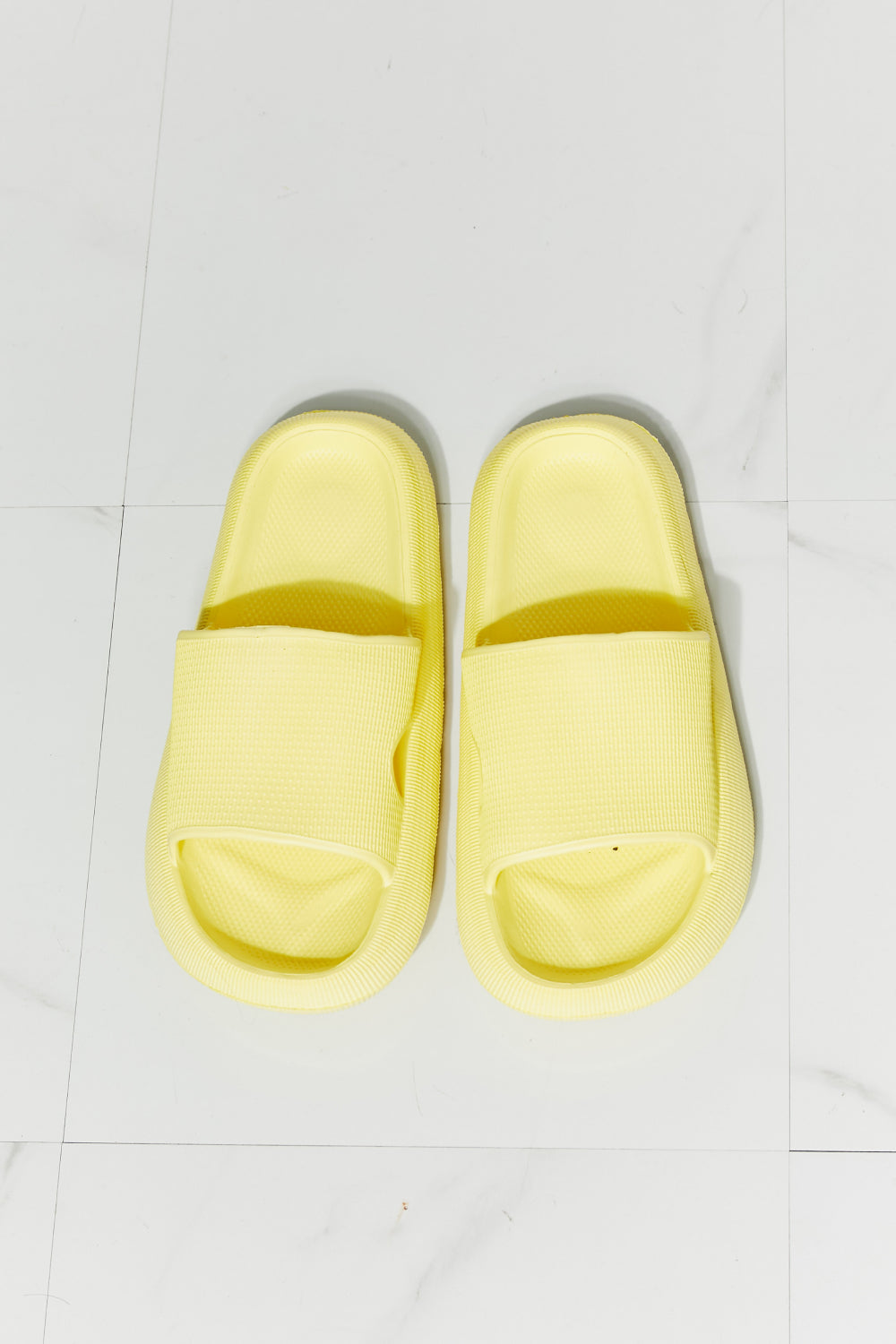 MMShoes Arms Around Me Open Toe Slide in vibrant yellow, showcasing a stylish and comfortable rubber design perfect for summer outings.