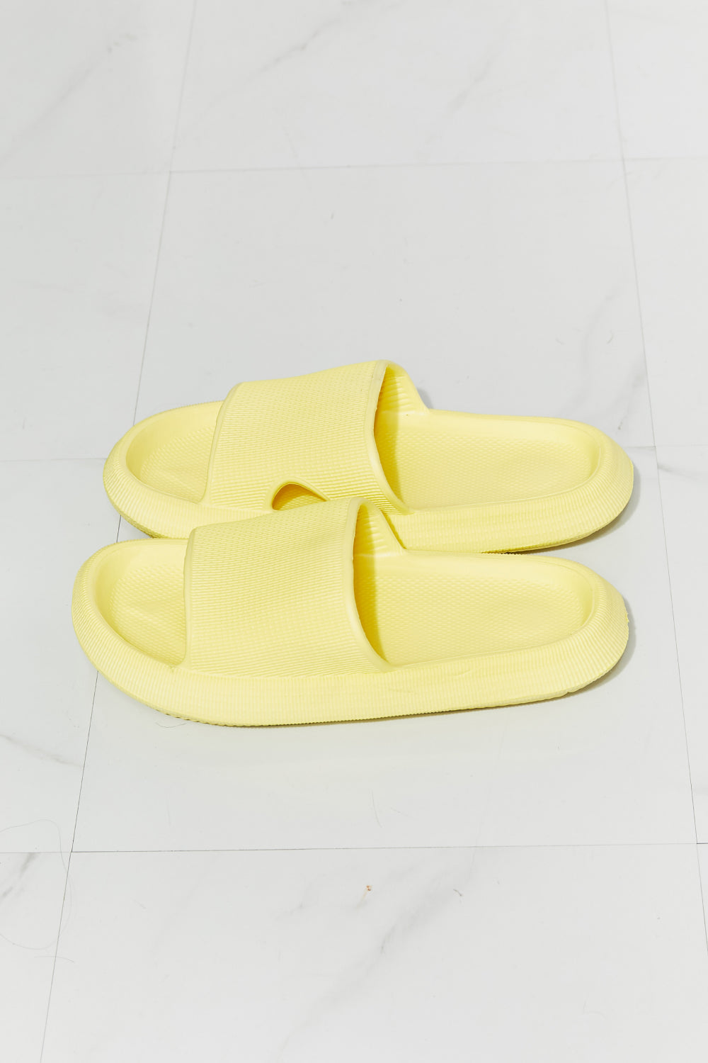 MMShoes Arms Around Me Open Toe Slide in vibrant yellow, showcasing a stylish and comfortable rubber design perfect for summer outings.