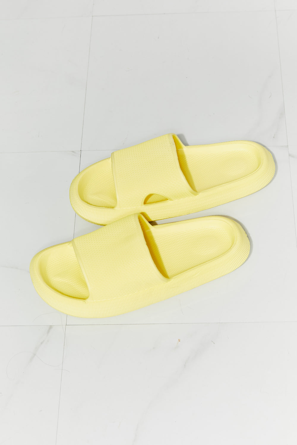 MMShoes Arms Around Me Open Toe Slide in vibrant yellow, showcasing a stylish and comfortable rubber design perfect for summer outings.