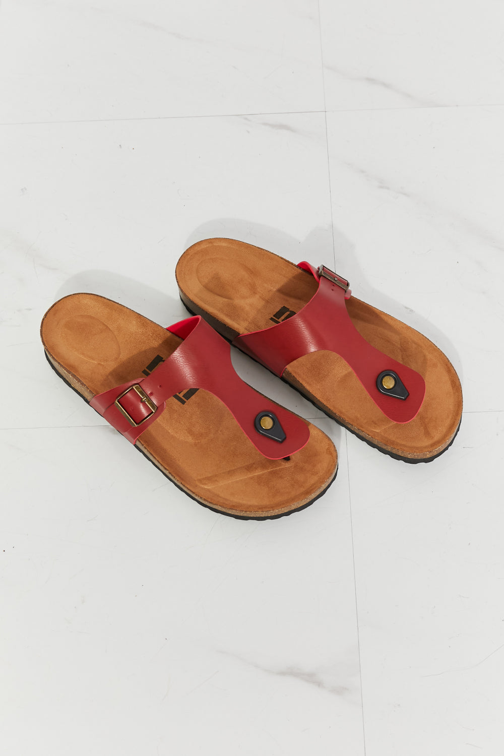 MMShoes Drift Away T-Strap Flip-Flop in Wine, showcasing the stylish T-strap design and secure buckle.