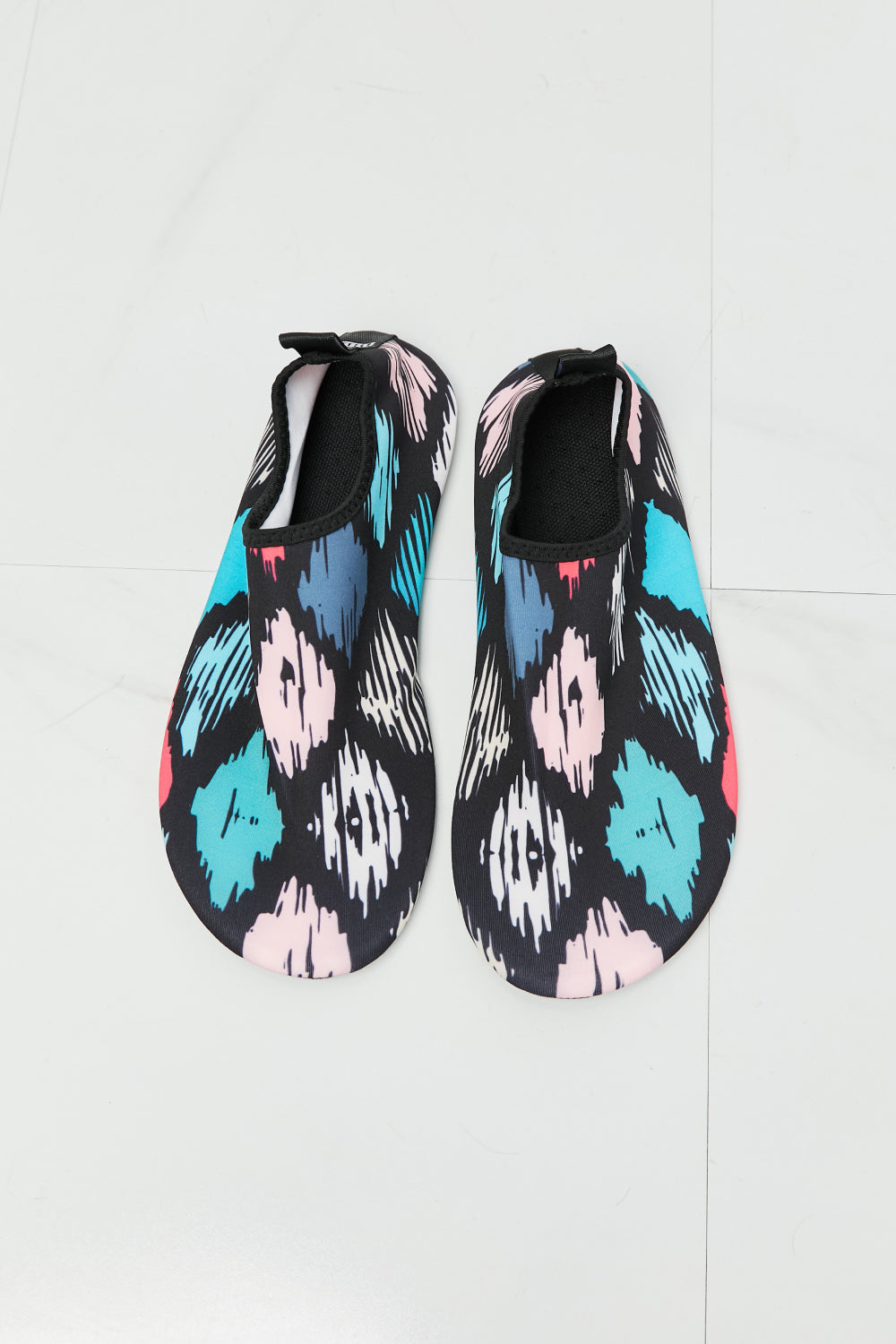 MMshoes On The Shore Water Shoes in a vibrant multicolored design, showcasing their round toe and durable outsole for water activities.