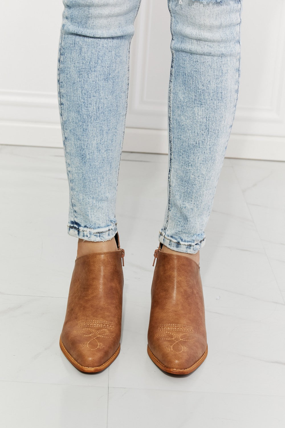 MMShoes Trust Yourself Embroidered Crossover Cowboy Bootie in Caramel, featuring a stylish crossover design and a 2.5-inch stacked heel.