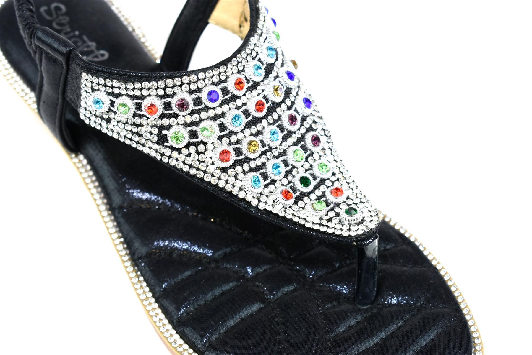 Elegant black slingback shoes with multigem detailing, perfect for stylish occasions.