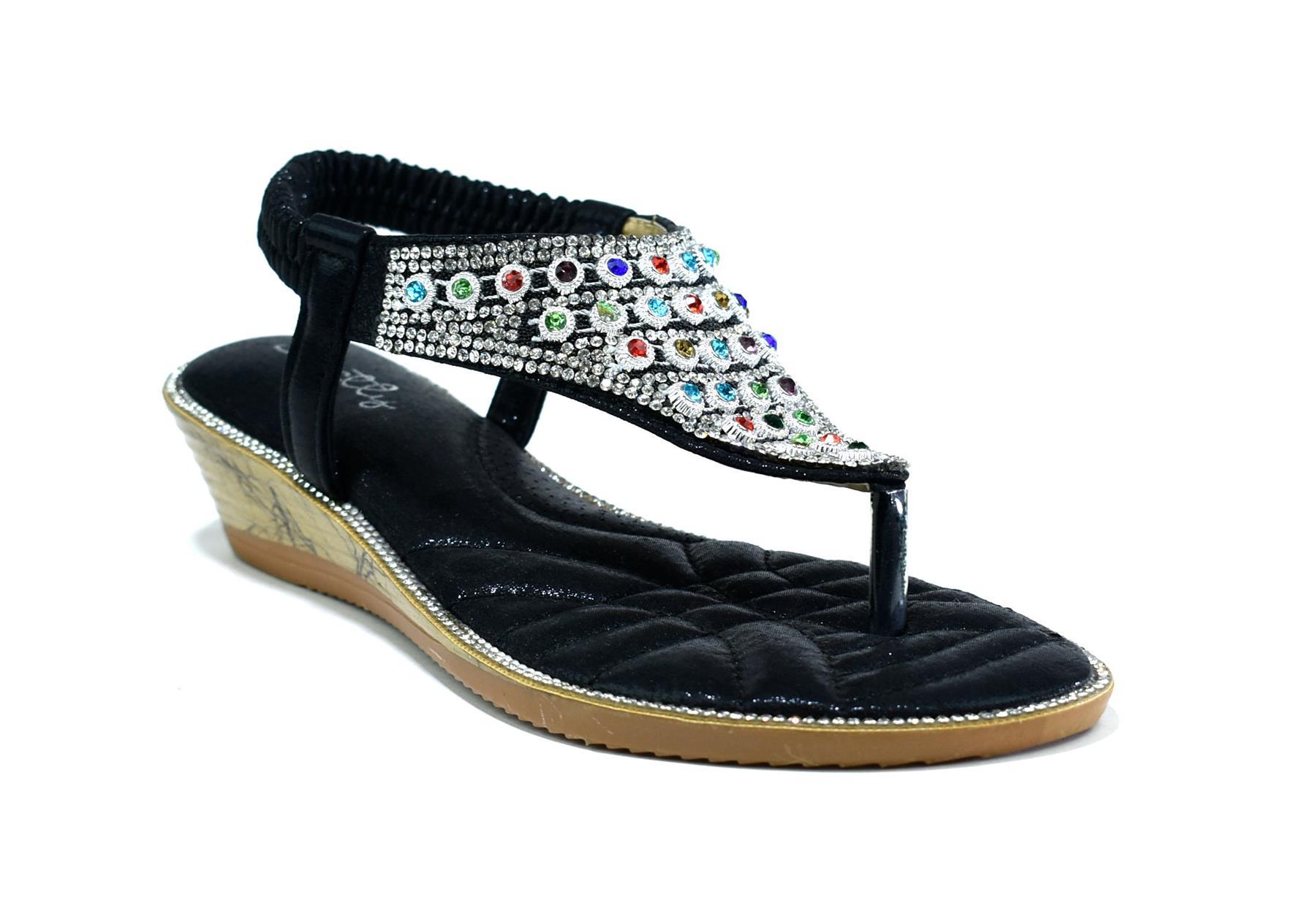 Elegant black slingback shoes with multigem detailing, perfect for stylish occasions.