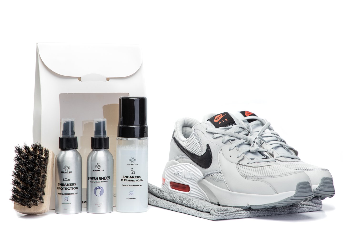 NANO UP Sneakers Cleaner & Protection Kit including cleaning foam, deodorant, waterproofing agent, brush, and microfiber cloth.